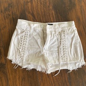 Express laced up distressed Jean shorts